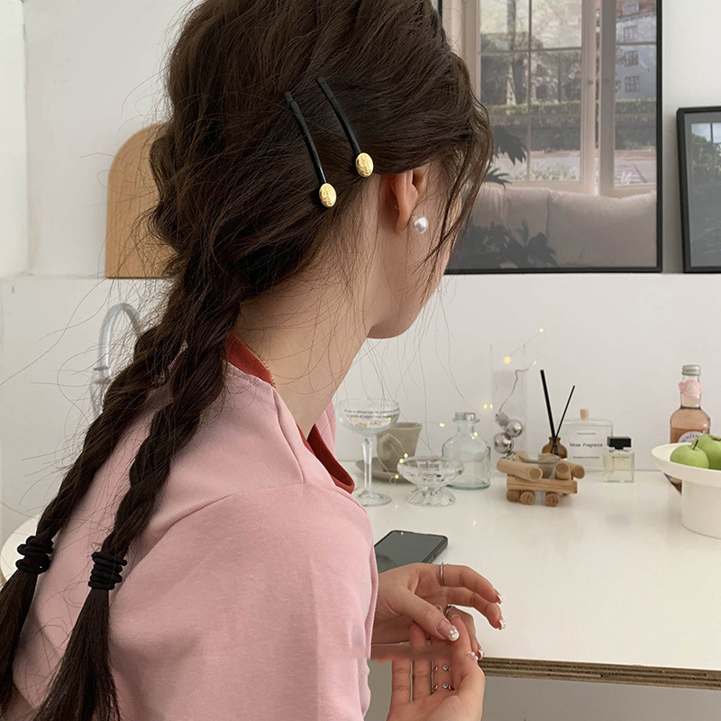 Pince à cheveux en forme de ba - Head Racket Boom avis et prix